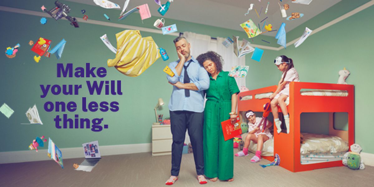 Mother and father falling asleep standing up after doing bed time with two primary school aged girls